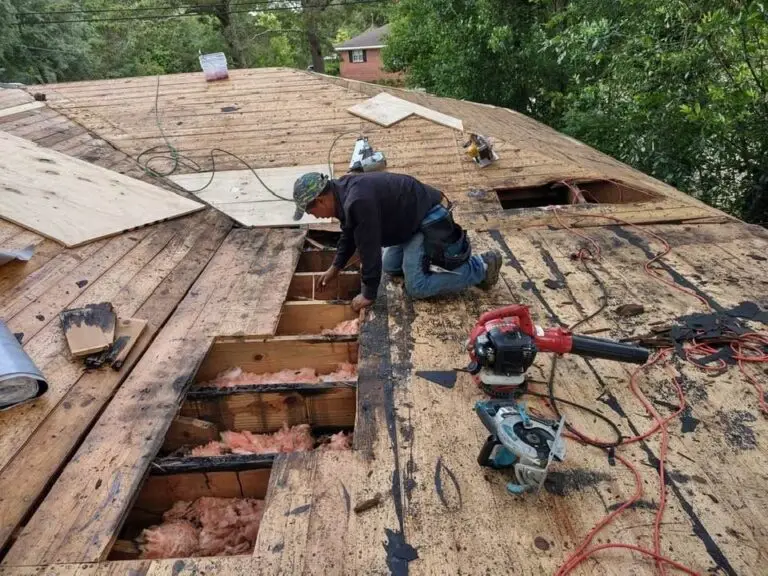 Roof replacement in Mobile, AL – ARC Roofing crew repairing the roof deck