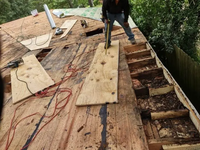 Roof replacement in Mobile, AL – ARC Roofing crew replacing damaged decking