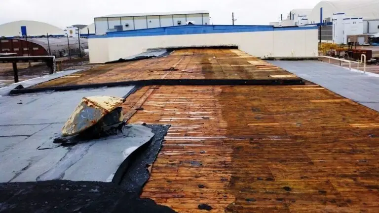 Commercial roof coating in Mobile, AL – aged roof surface before restoration