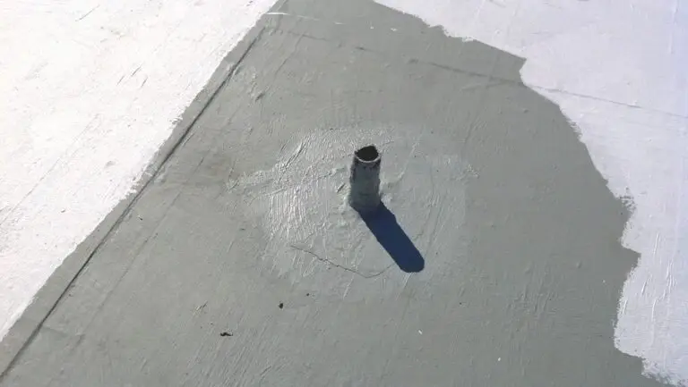 Commercial roof coating in Mobile, AL – pipe penetration sealed and coated
