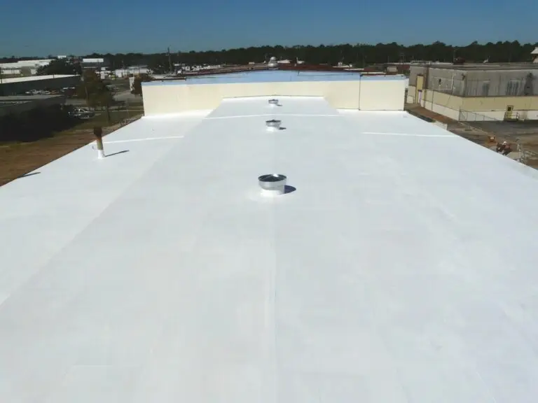 Completed commercial roof coating in Mobile, AL – white reflective roof coating