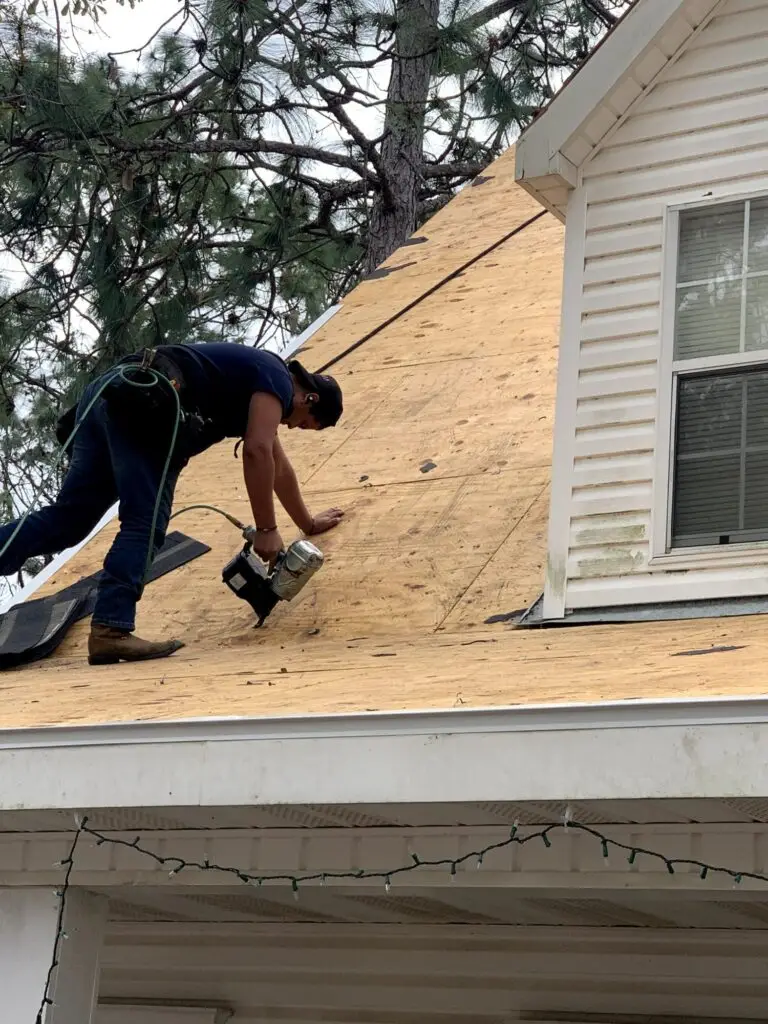 Roof replacement in Daphne, AL – ARC Roofing crew installing new roof decking