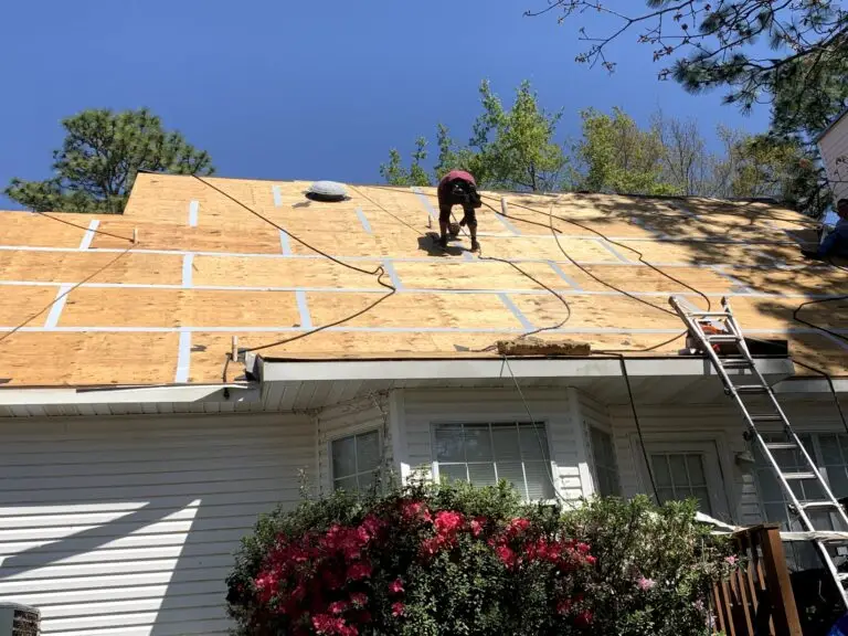 Roof replacement in Daphne, AL – ARC Roofing crew on the new roof deck