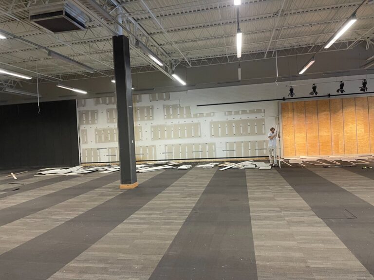 Commercial demolition in Mobile, AL: demo underway – fixtures cleared from the sales floor
