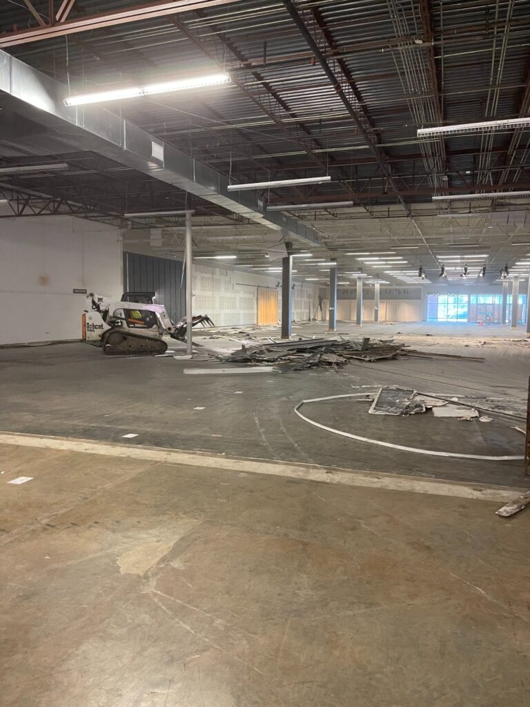 Commercial demolition in Mobile, AL: debris piled for haul-off
