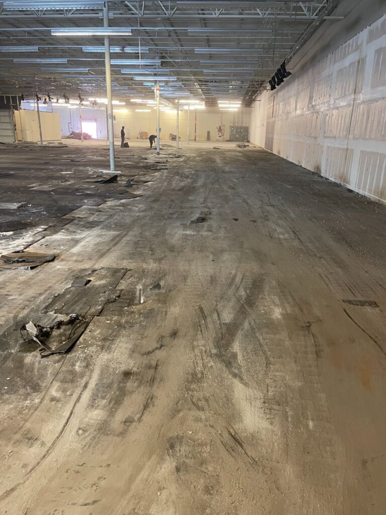 Commercial demolition in Mobile, AL: floor stripped down to the concrete