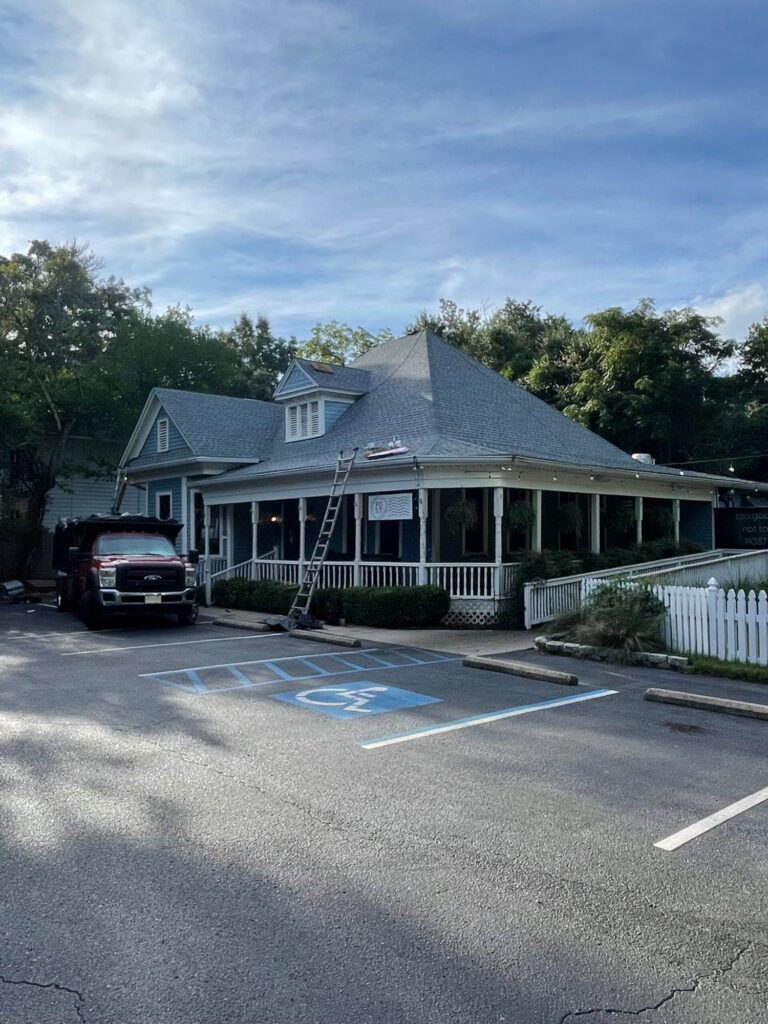 Roof replacement in Mobile, AL: before – the building before the reroof