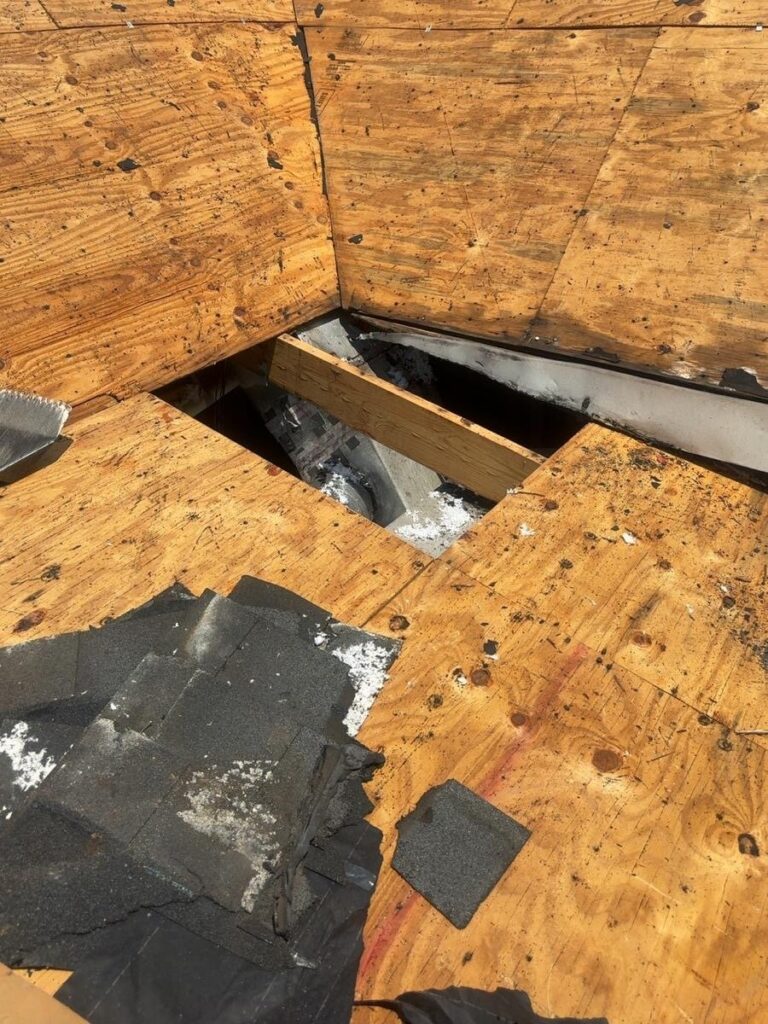 Roof replacement in Mobile, AL: decking repair – rotted section cut out for replacement
