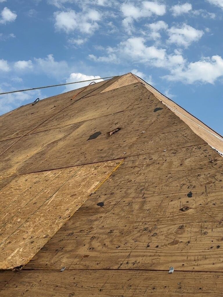 Roof replacement in Mobile, AL: new decking installed on the main roof