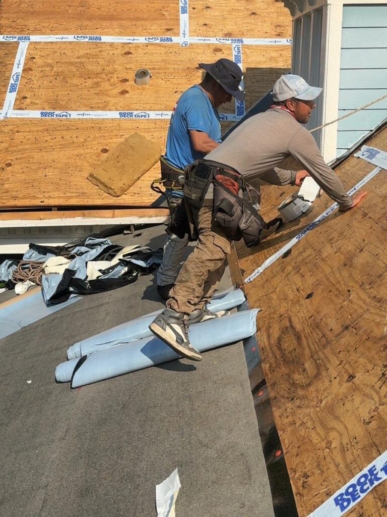 Roof replacement in Mobile, AL: ARC crew installing new decking and underlayment