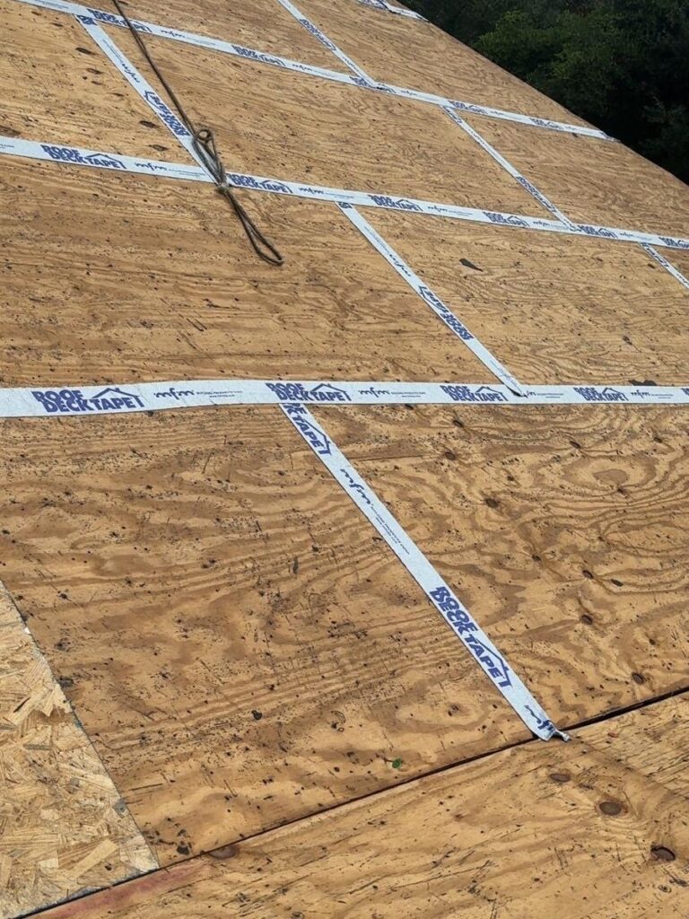 Roof replacement in Mobile, AL: underlayment going down across the roof