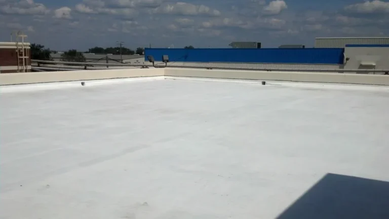 Completed white reflective coating on a commercial concrete roof deck